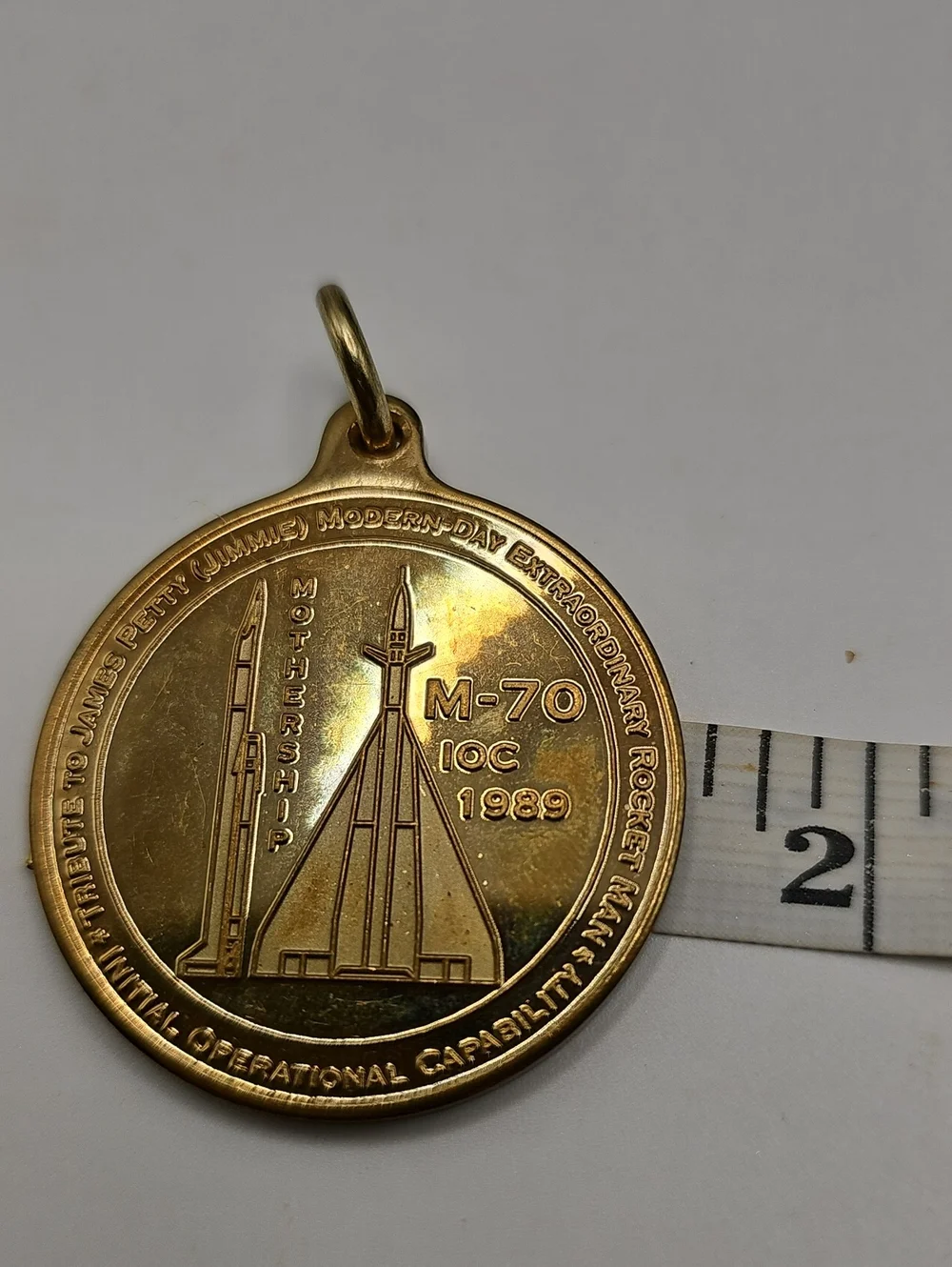Vintage 1989 James Petty M-70 Mothership Medal Pendant Mens OS Gold Space Rocket